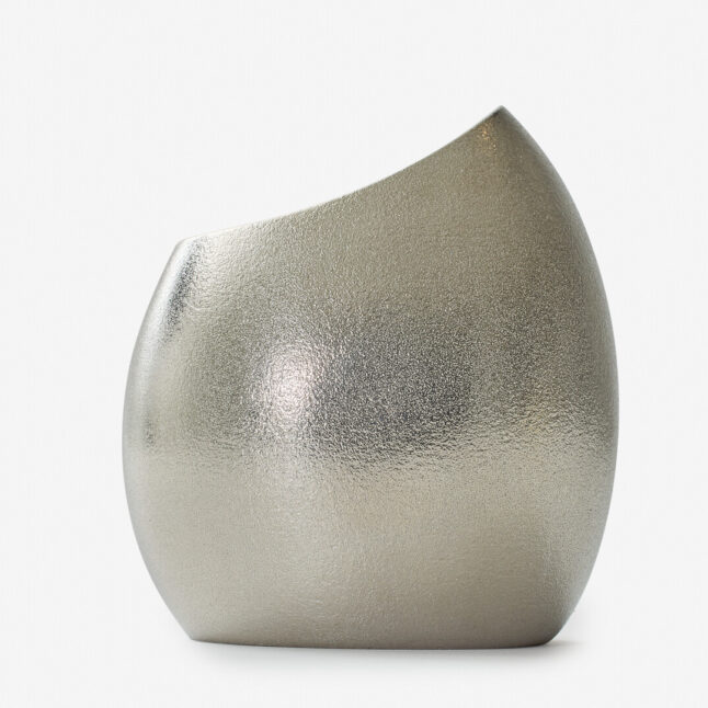 A tin vase shaped like a cocoon from Nousaku