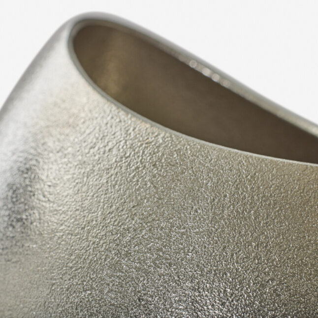 A tin vase shaped like a cocoon from Nousaku
