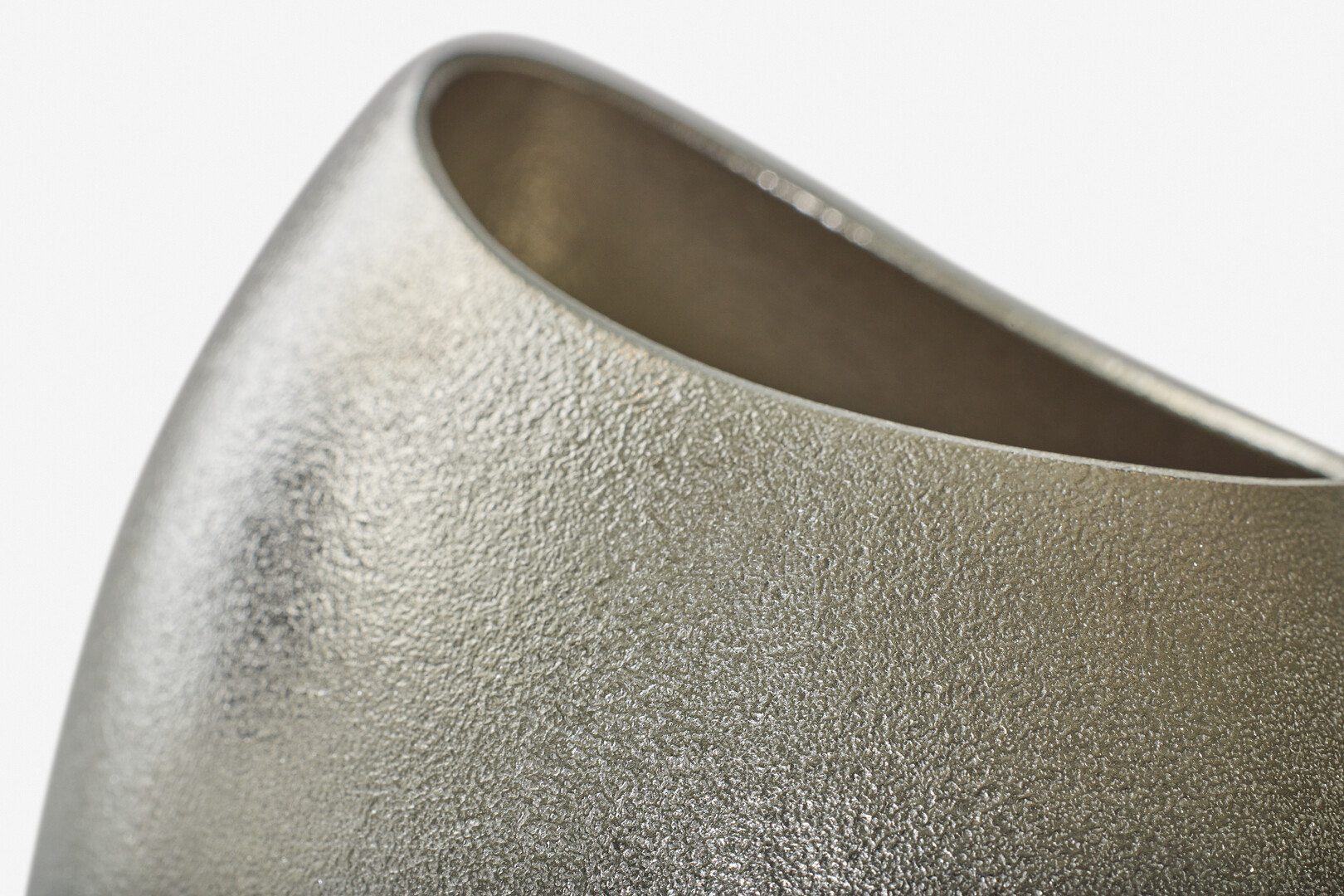 A tin vase shaped like a cocoon from Nousaku