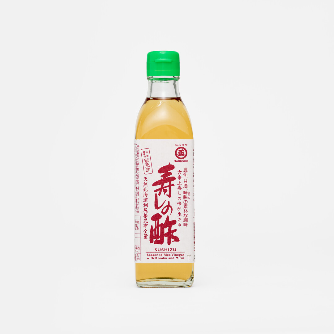 Marushō Sushi Vinegar in a rectangular bottle with green lid from Japan House London