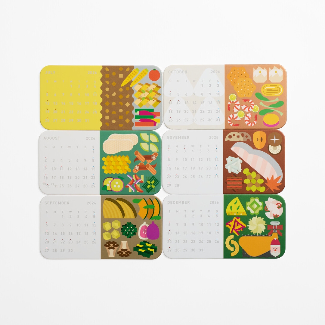 A bento shaped calendar with monthly cards with illustrations of seasonal bentos from July till December from Japan House London.