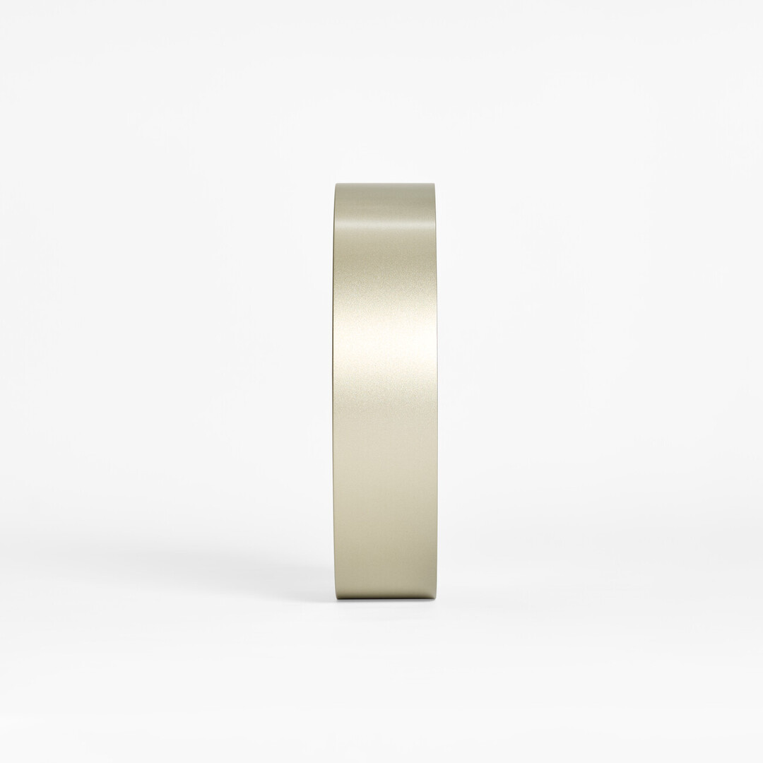 The side profile of the white wall Riki Ring Clock with silver frame from Japan House London.