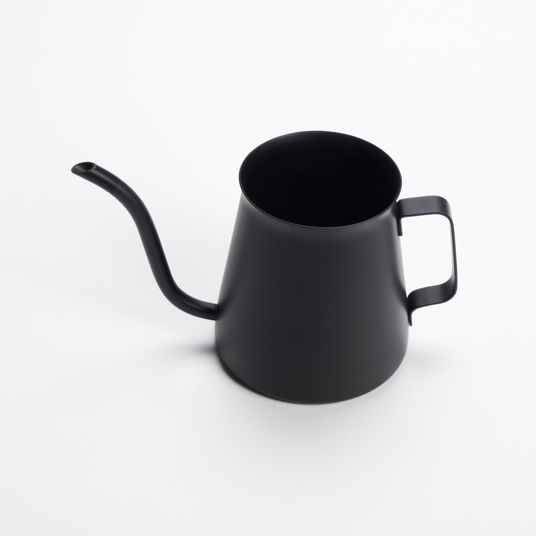 A black Hario Kasuya Mini Drip Kettle 300ml for pouring hot water over coffee grounds from Japan House London.
