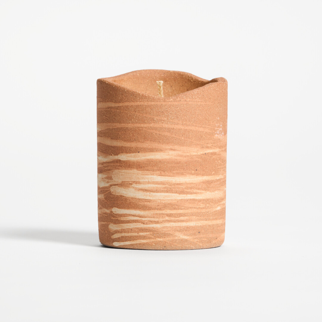 Scented Candle with Shigaraki-yaki Holder, a terracotta ceramic holder with white streaks across in the scent of Akikaze - Sandalwood & Clove from Japan House London.