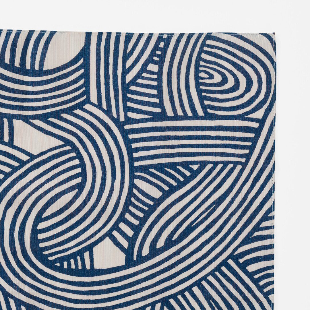 Furoshiki with a pattern of knots in navy from Japan House London.