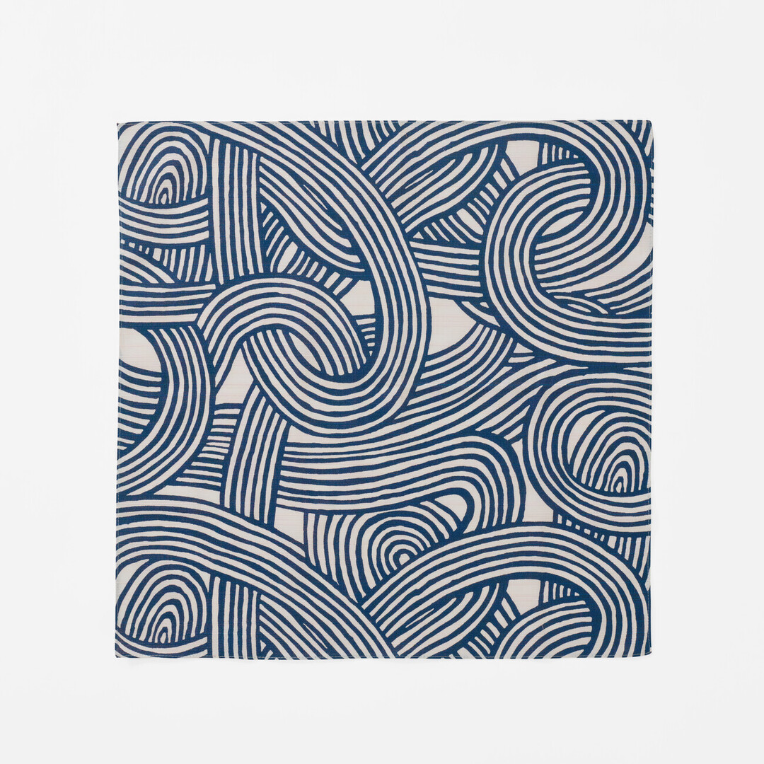 Furoshiki with a pattern of knots in navy from Japan House London.