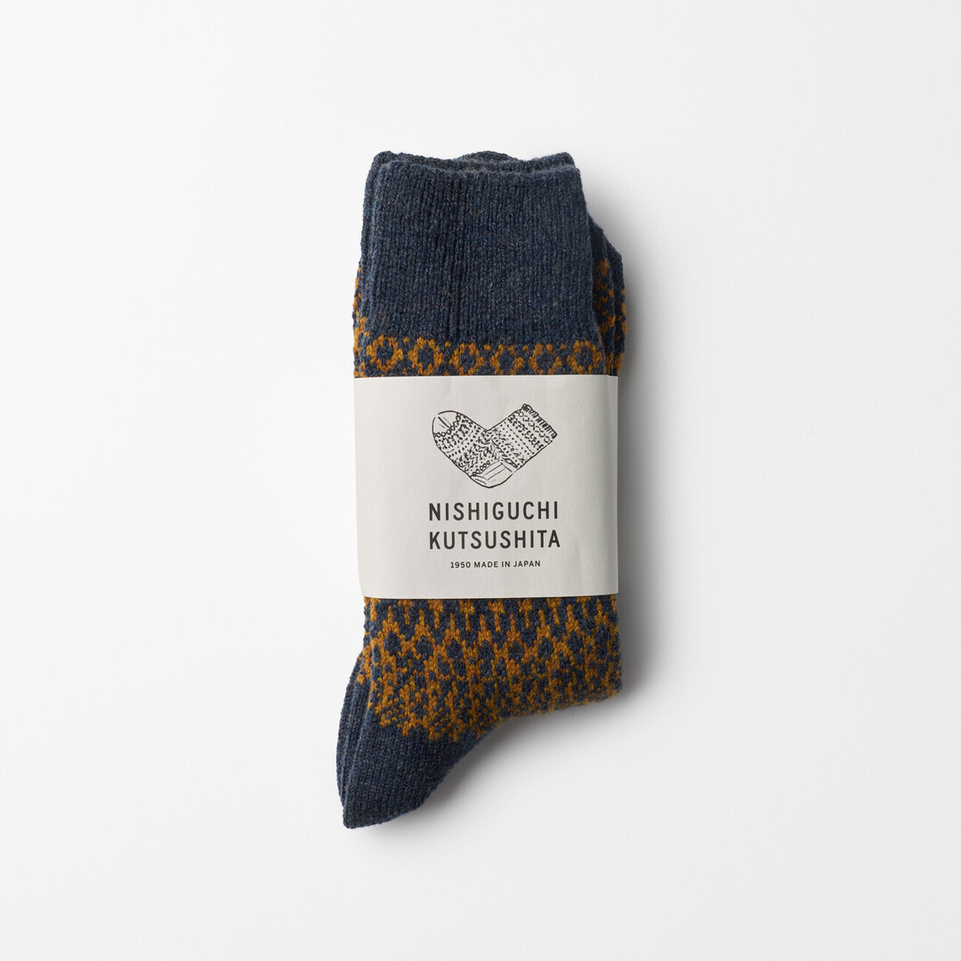 The Wool Jacquard Socks in navy by Nishiguchi Kutsushita from Japan House London.