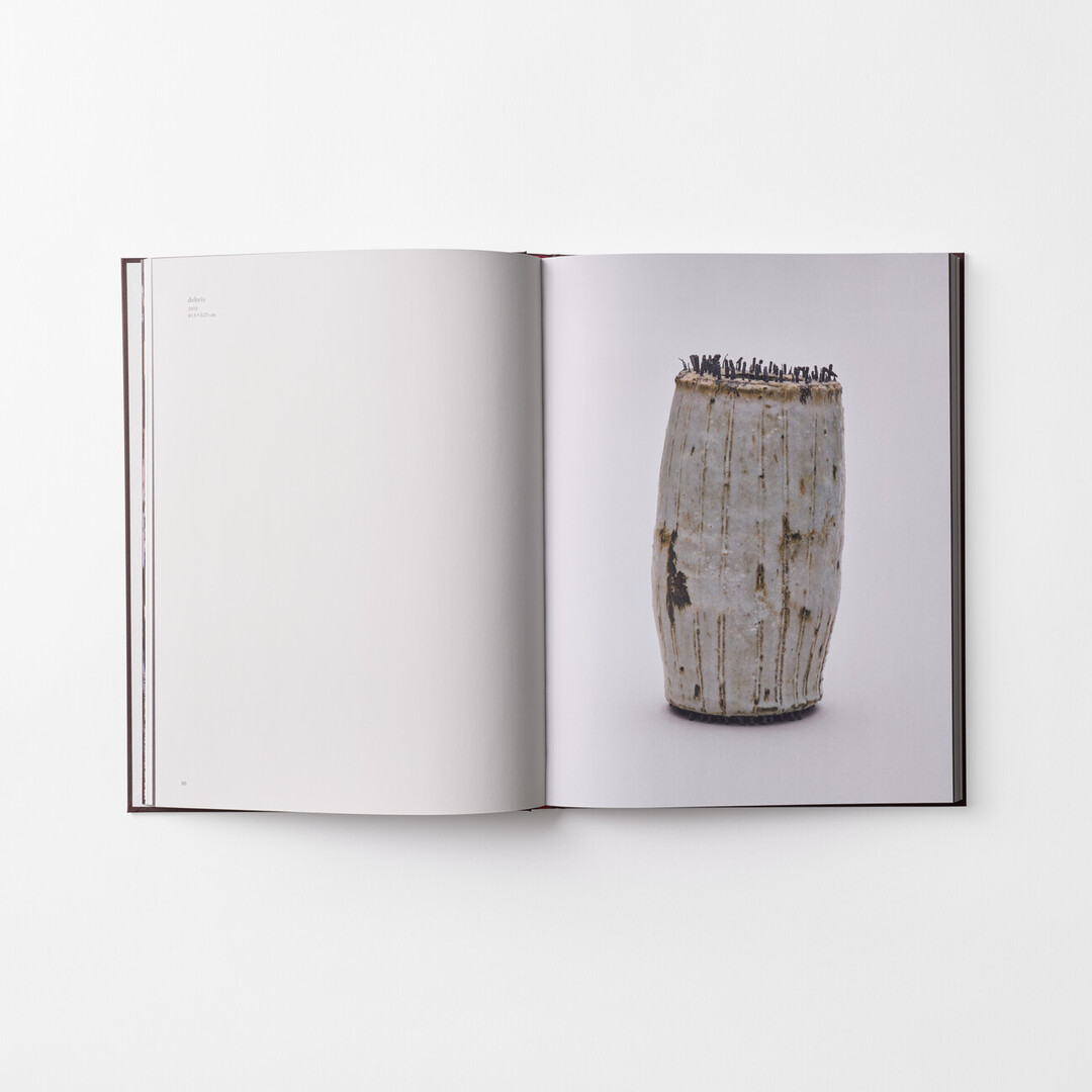 A spread with a sculptural piece of Ono Teppei, the book Teppei Ono the Works from Japan House London.