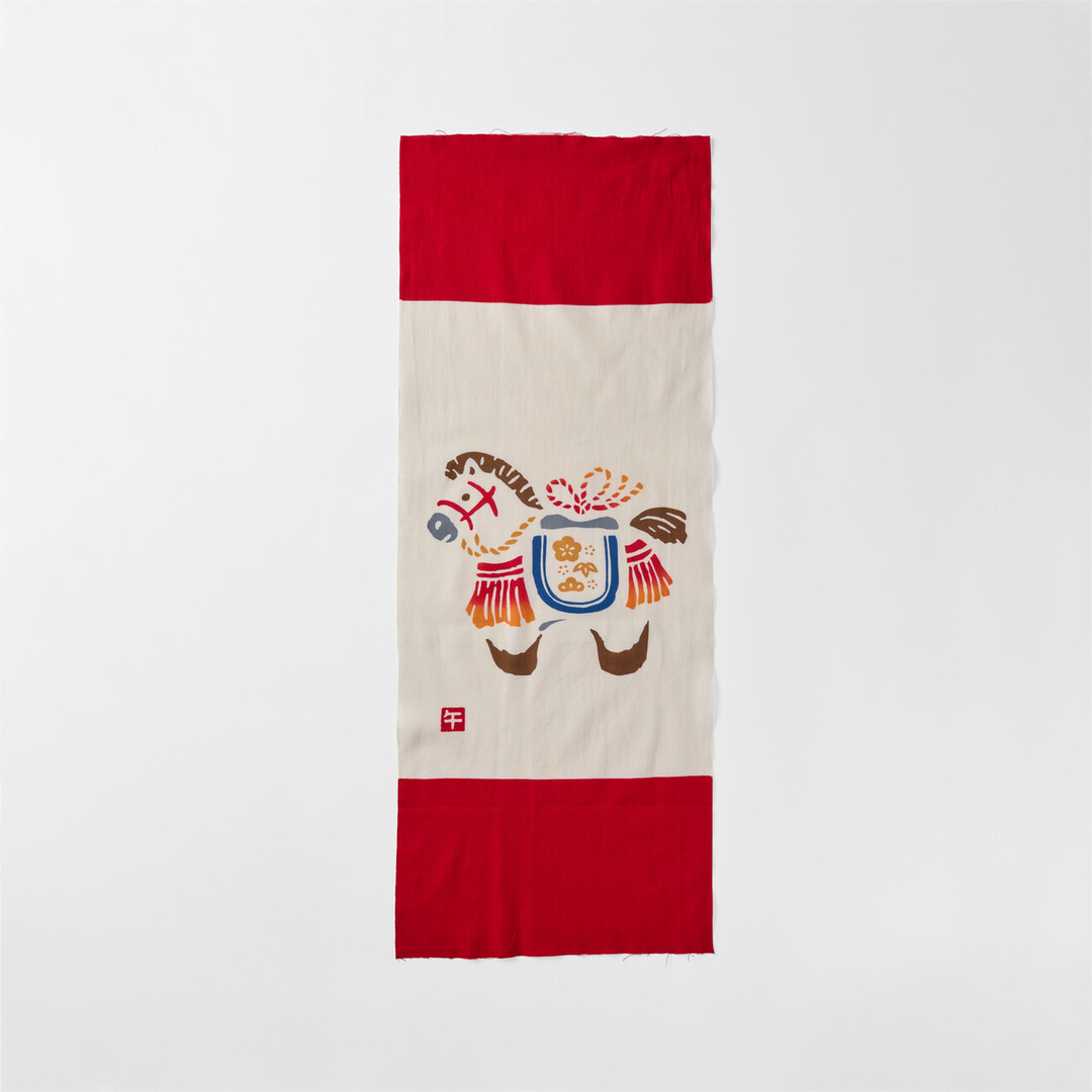 Tenugui with a Decorative Horse by Kamawanu from Japan House London.