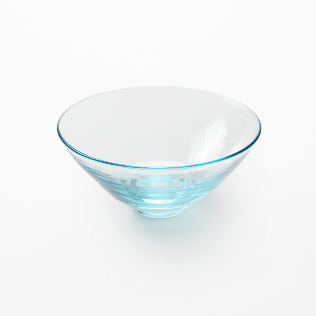 A blown glass sake cup by Arinaga Kōta from Japan House London.