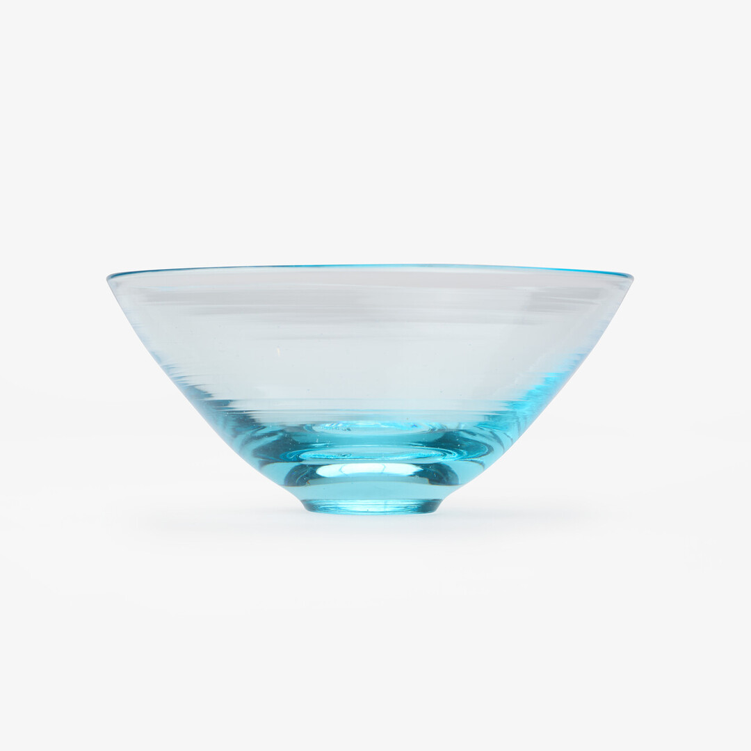 A blown glass sake cup by Arinaga Kōta from Japan House London.