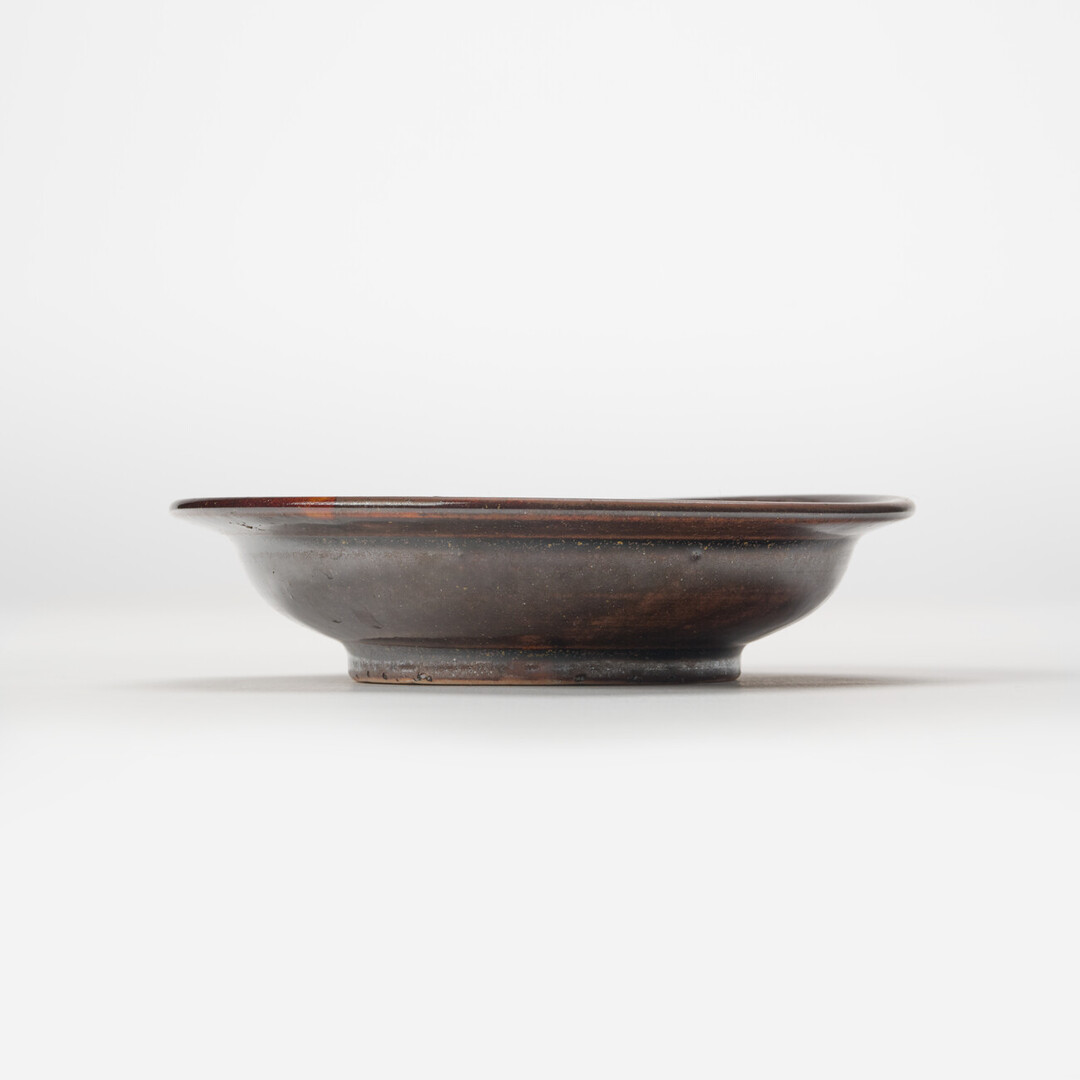 Small Tenmoku Glaze Plate by Asai Yōsuke from Japan House London.