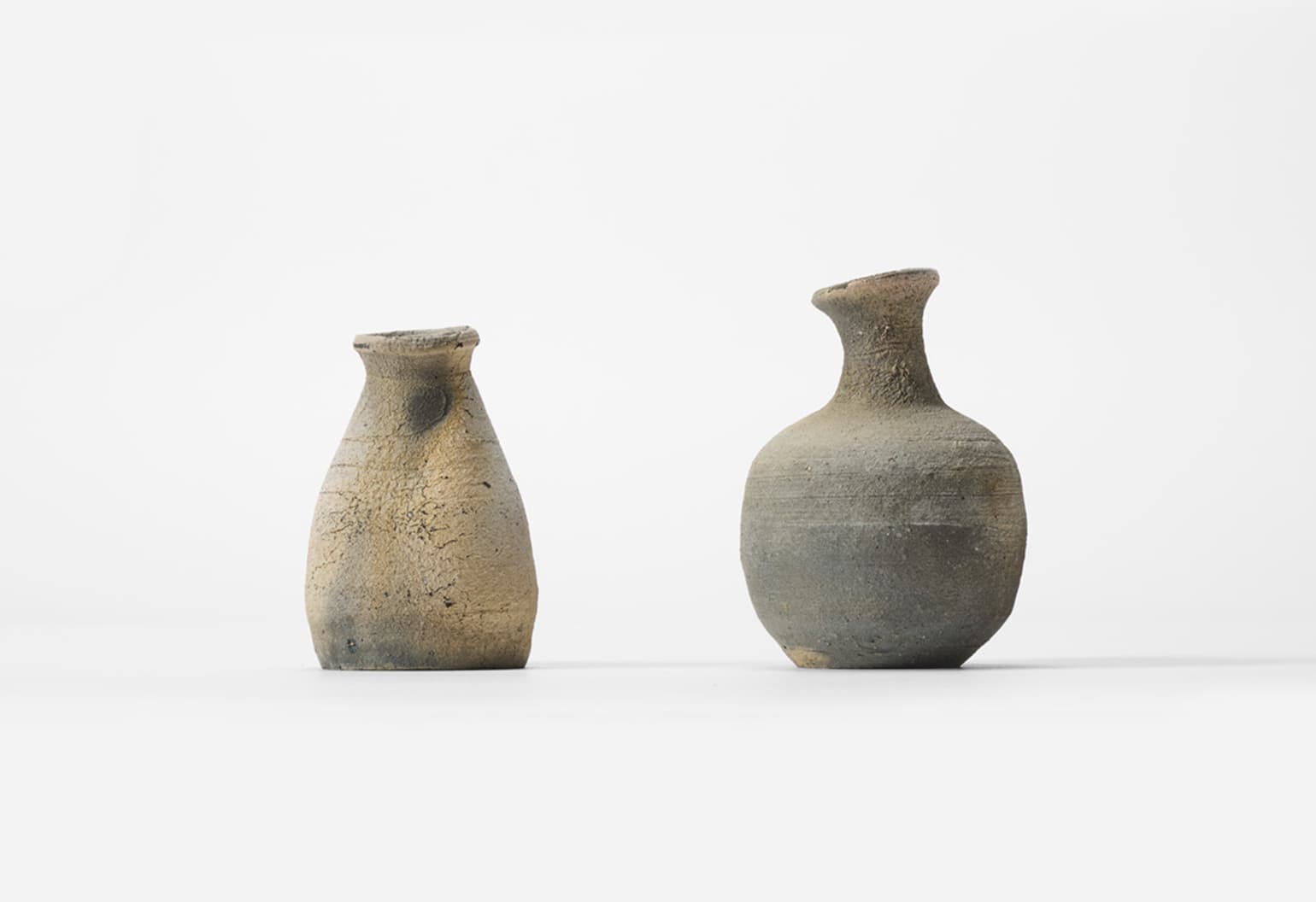 Two ceramic flower vases by Tsubota Kazuhiro from Japan House London.