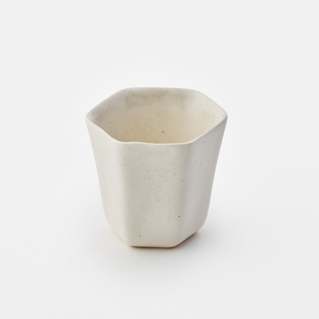 Porcelain Hexagonal Tea Cup by Iyama Mikiko from Japan House London.