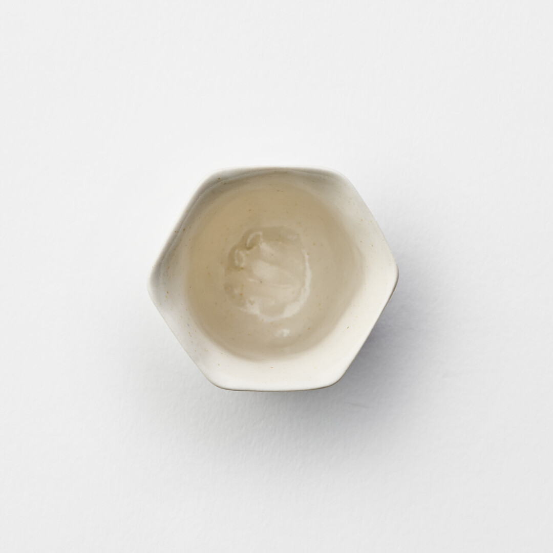 Porcelain Hexagonal Tea Cup by Iyama Mikiko from Japan House London.