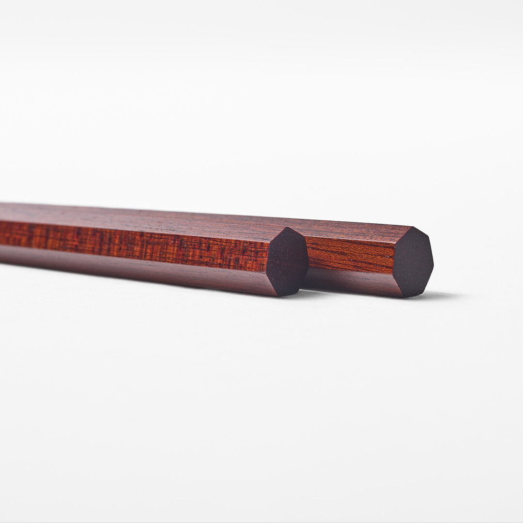 Dark brown Heptagon Satine Chopsticks by Daikokuya from Japan House London.
