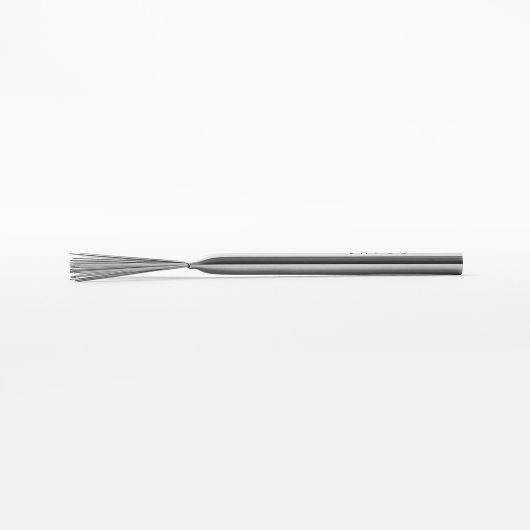 A stainless steel grater brush by Eatoco from Japan House London.