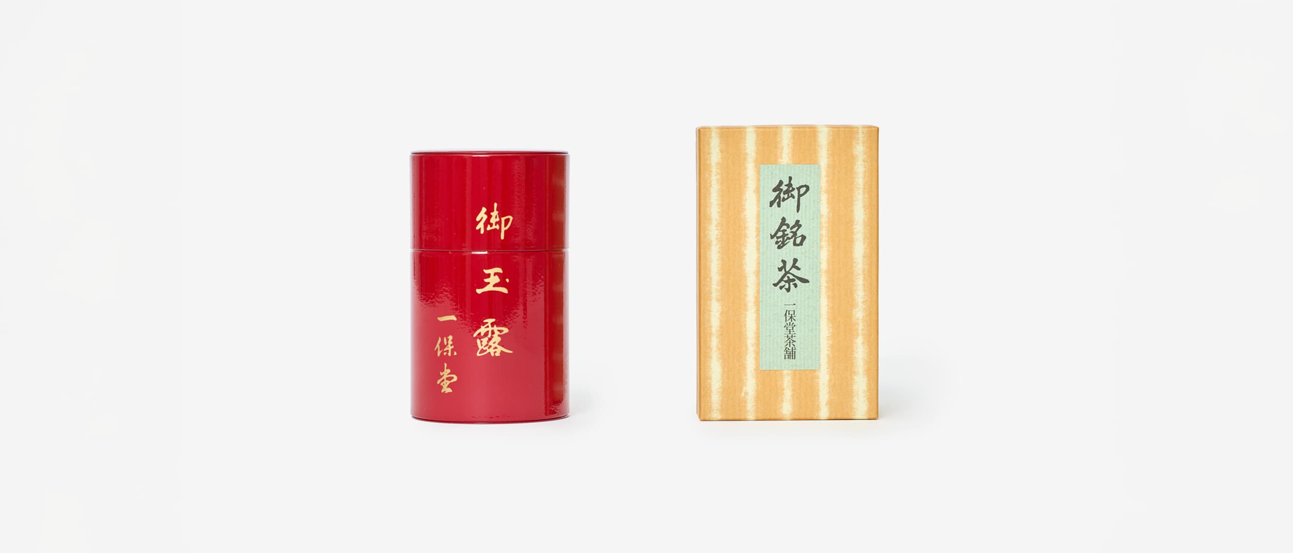 A red can of Gyokuro tea from Ippodo next to a brown box packaging.