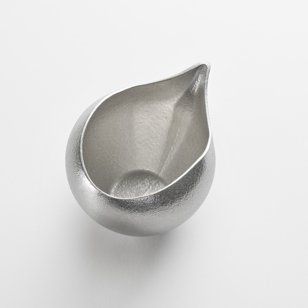 Rounded Sake tin pitcher by Nousaku from Japan House London.