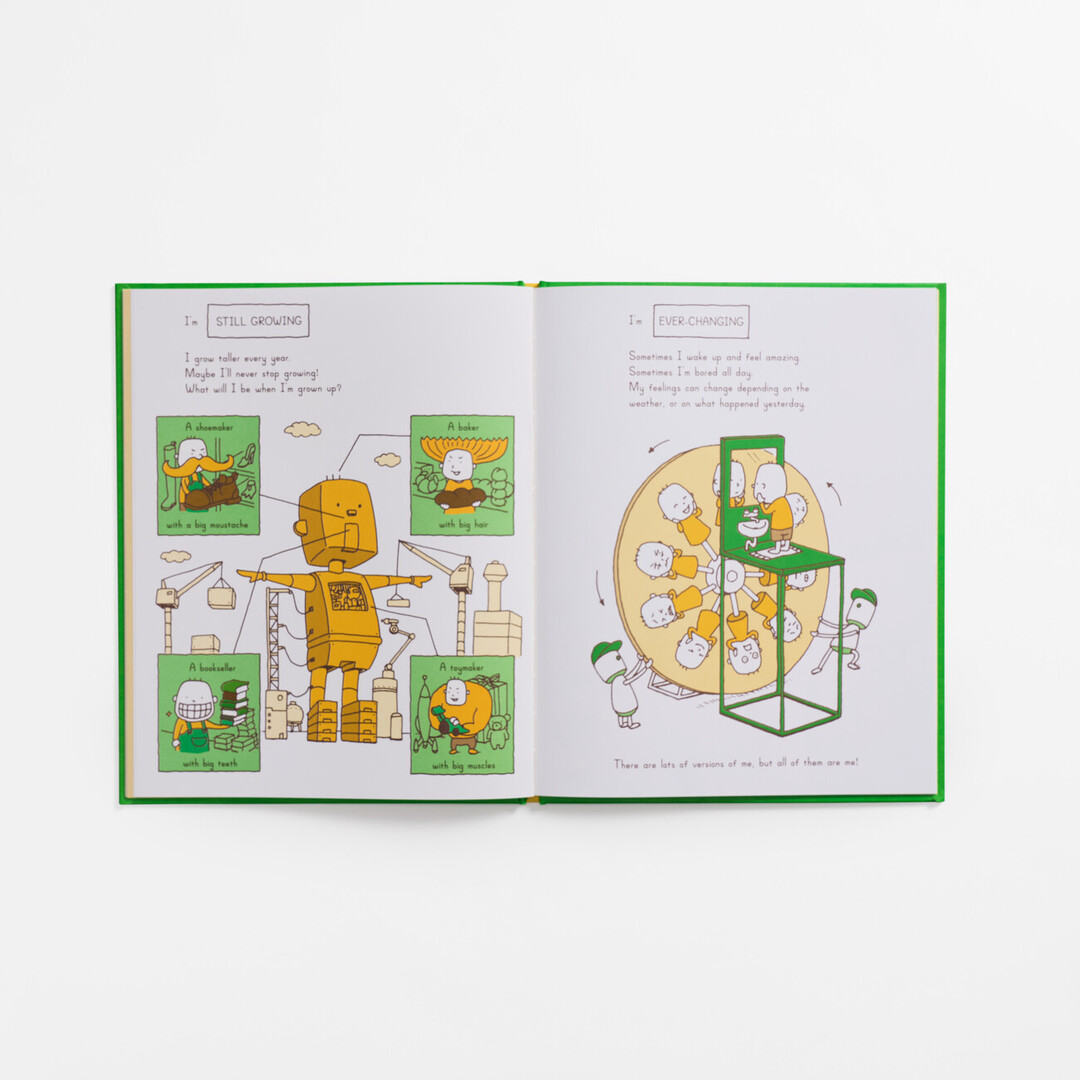 The yellow and green spread of 'CAN I BUILD ANOTHER ME?' with illustrations of a boy and a robot and by Yoshitake Shinsuke from Japan House London.