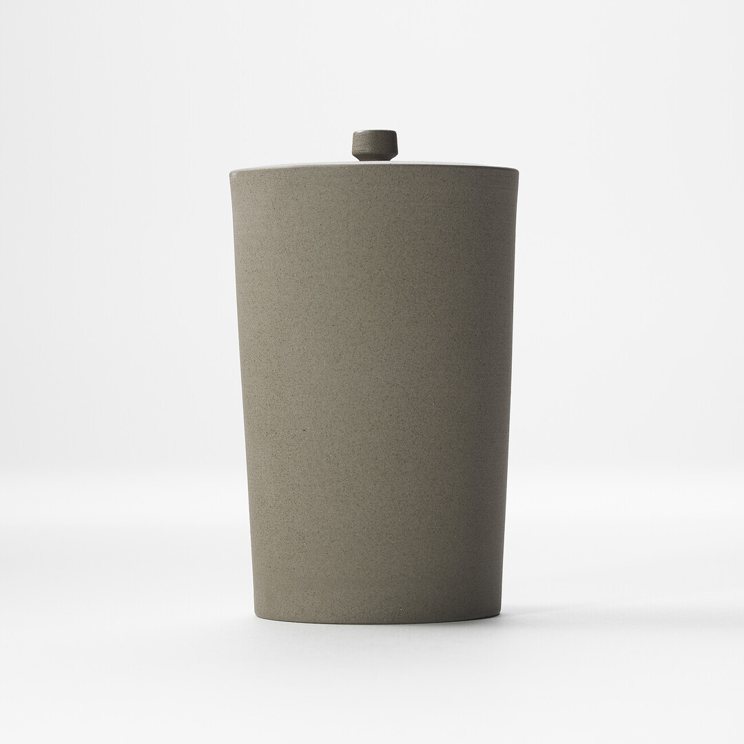 A grey ceramic tea caddy by Jinsui from Japan House London.