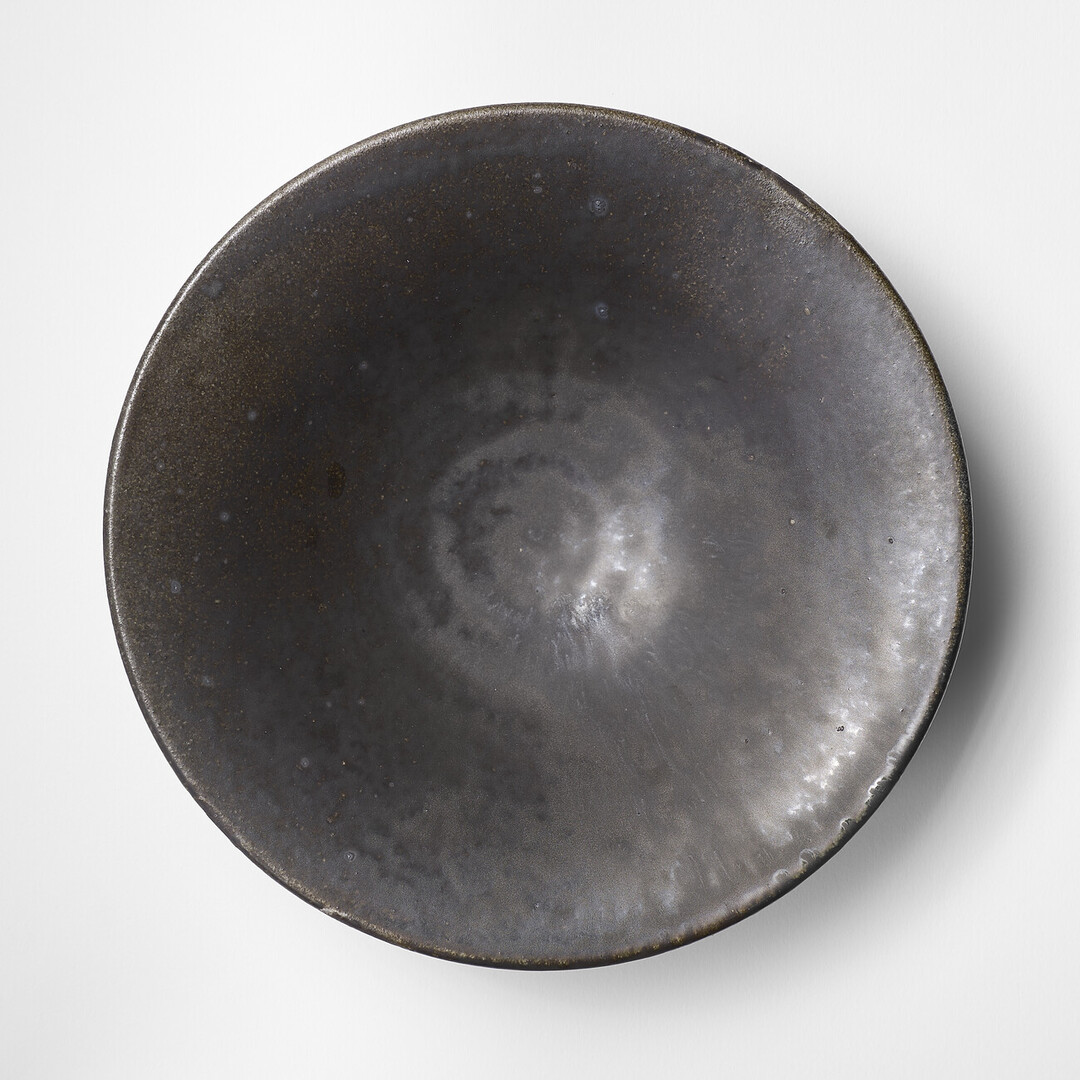 A large bowl with black glaze by Shimomura Atsushi from Japan House London.