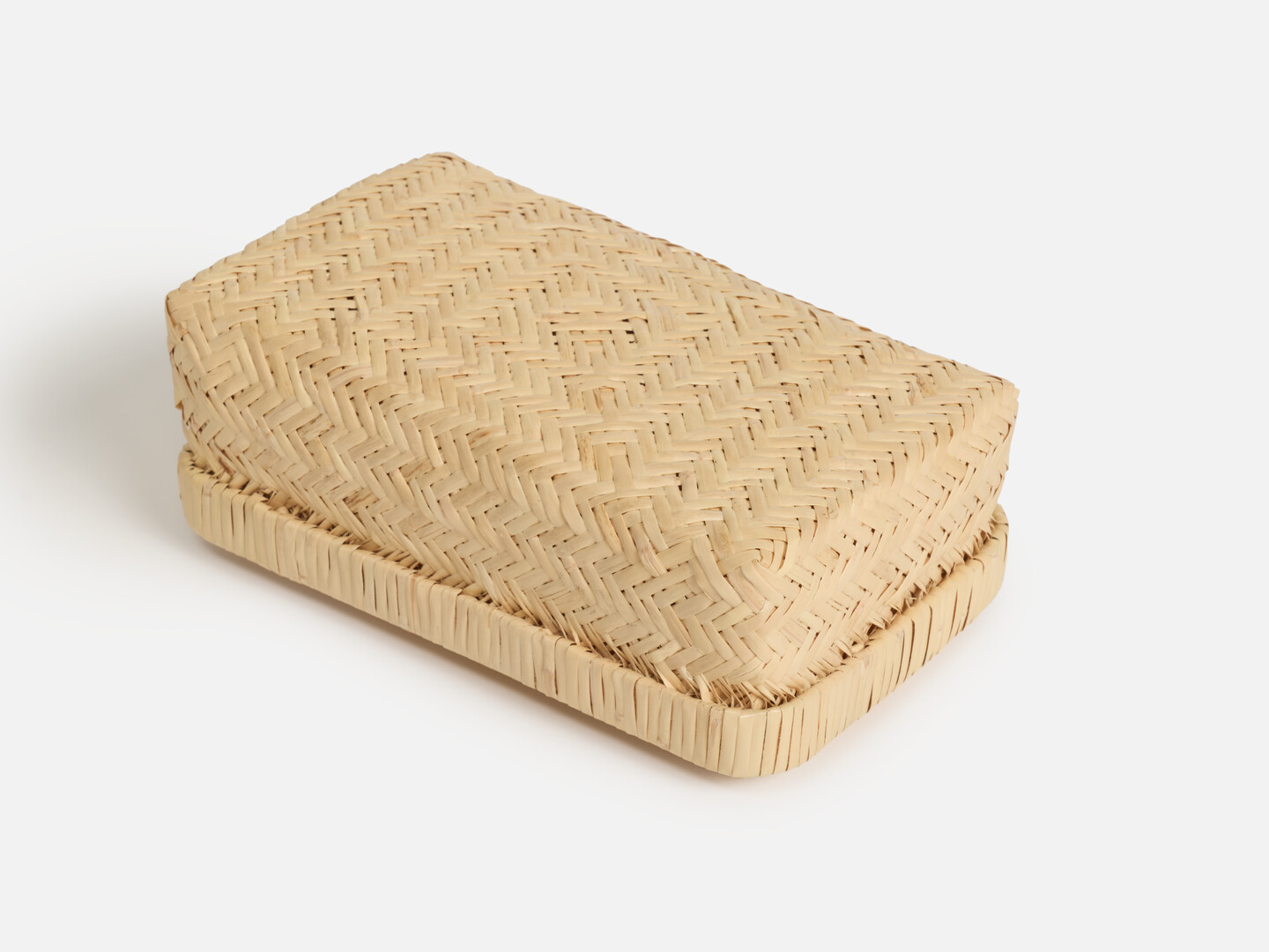 A rectangular woven bamboo sandwich box by Matsunoya from Japan House London.