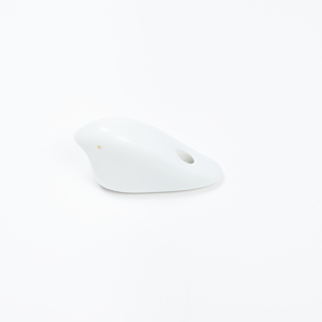 A dove shaped white porcelain incense holder by Kyukudo from Japan House London.