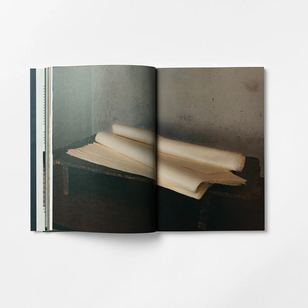 Spread of the book Japanese Handmade Paper and Paper Thread with image of fabric made of paper from Japan House London.