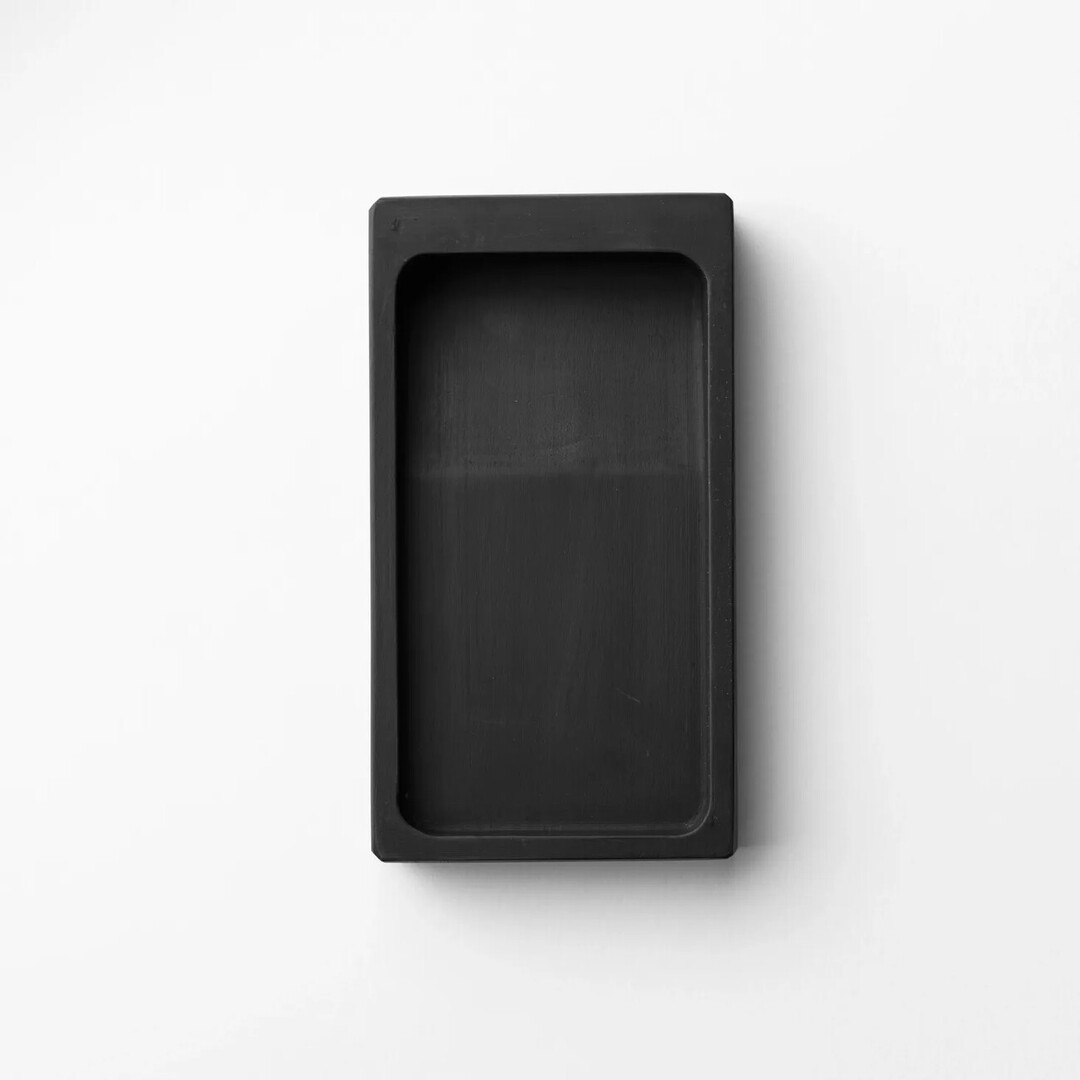 Black rectangular inkwell for calligraphy by Akashiya from Japan House London.