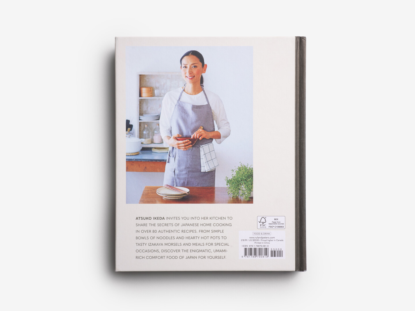 Back book cover of Atsuko's Japanese Kitchen with a picture of Ikeda Atsuko from Japan House London.