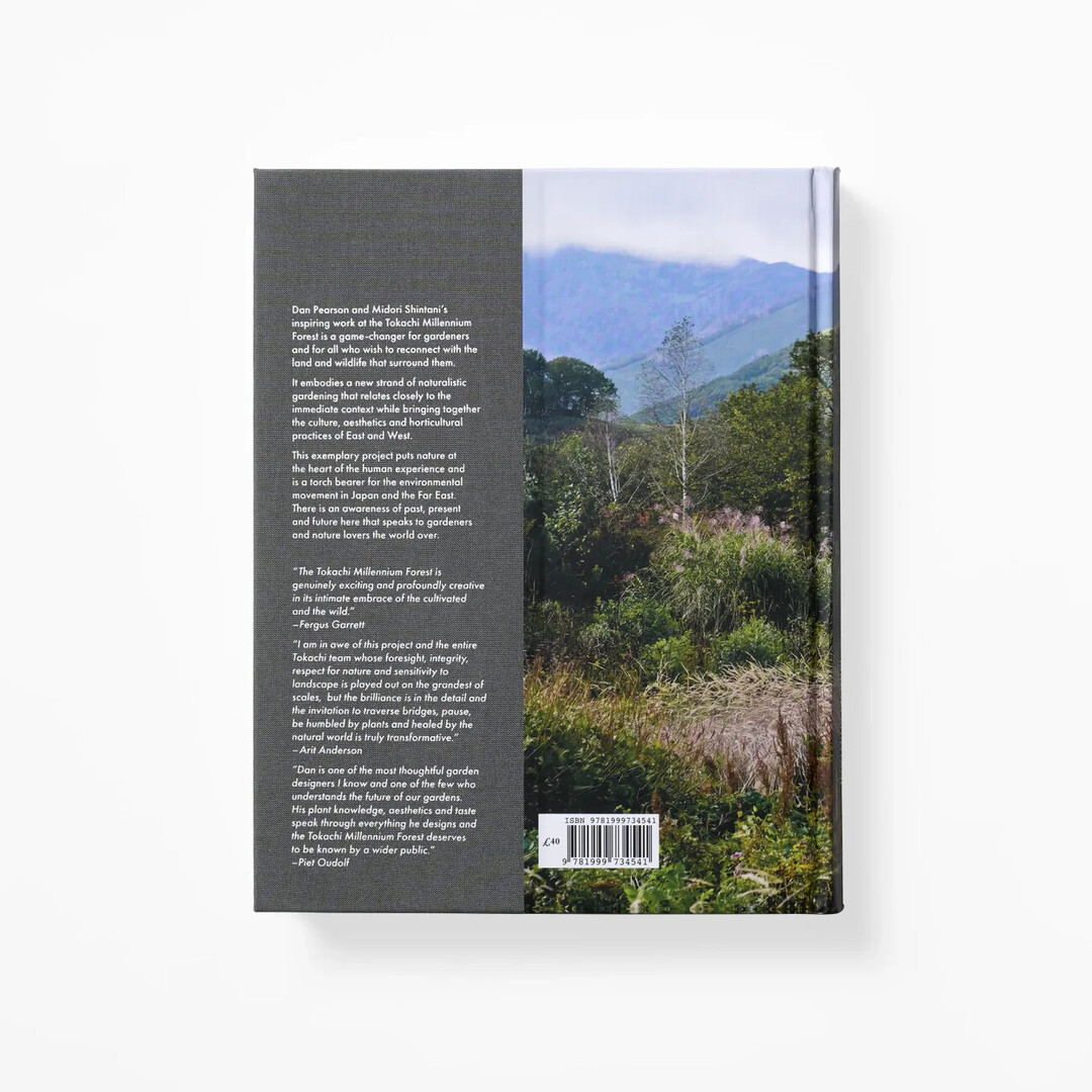 A back cover of Tokachi Millennium Forest with image of the forest from Japan House London.