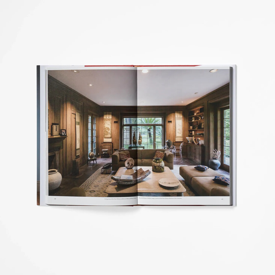 A spread of The Allure of Japanese Contemporary Ceramics with a photo of ceramics in a luxurious room from Japan House London.