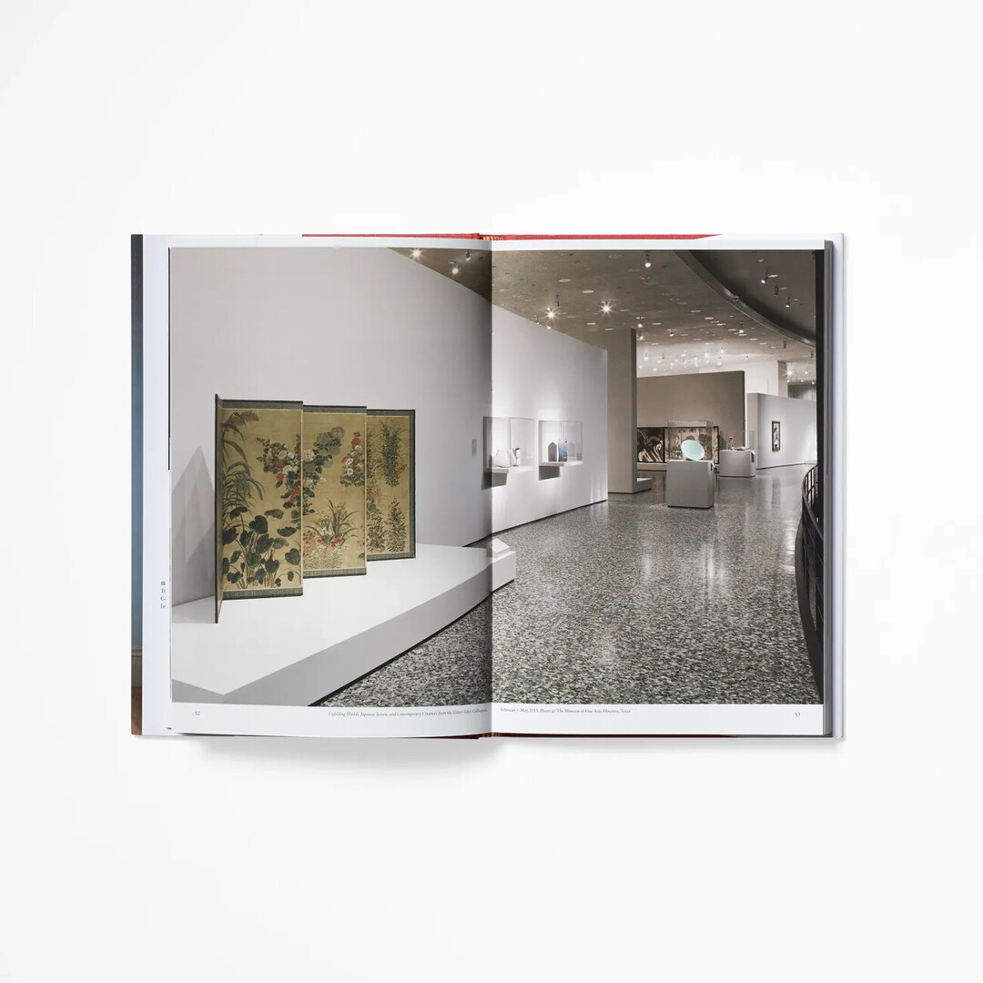 A spread of The Allure of Japanese Contemporary Ceramics with a photo of ceramics in a scene from a gallery from Japan House London.