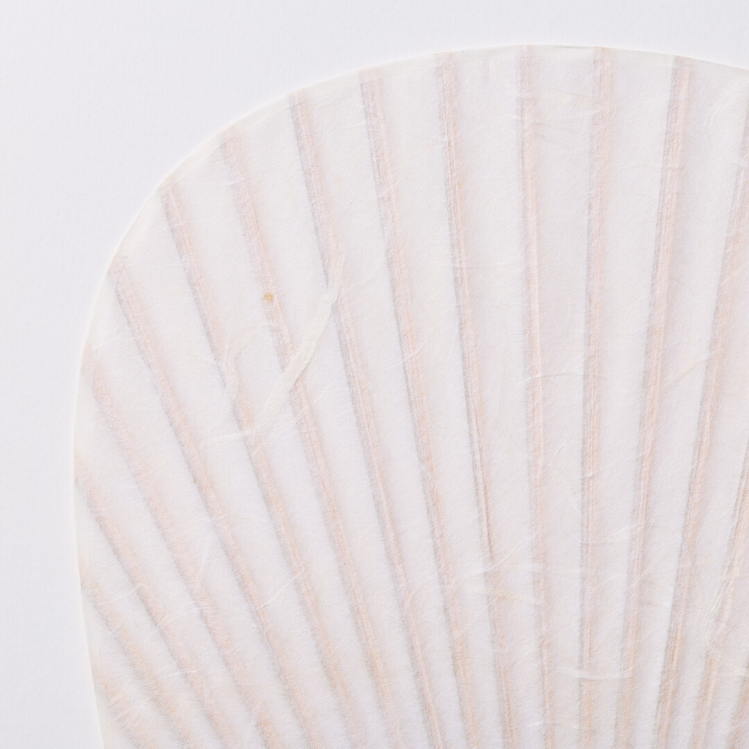 Japanese Bamboo Paper Oval Fan - Unryu by Uchiwaya Ryō from Japan House London.