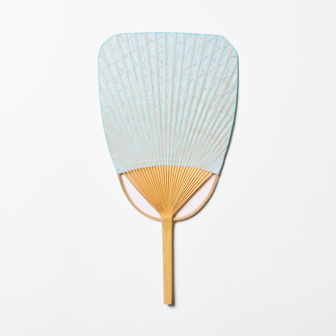 Light blue textured Japanese Bamboo Paper Square-Topped Fan by Uchiwaya Ryō from Japan House London.