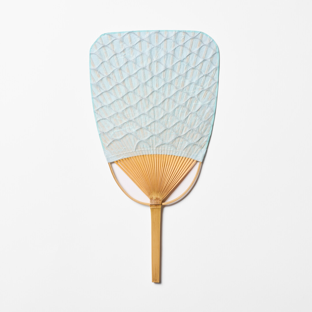 Light blue textured Japanese Bamboo Paper Square-Topped Fan by Uchiwaya Ryō from Japan House London.