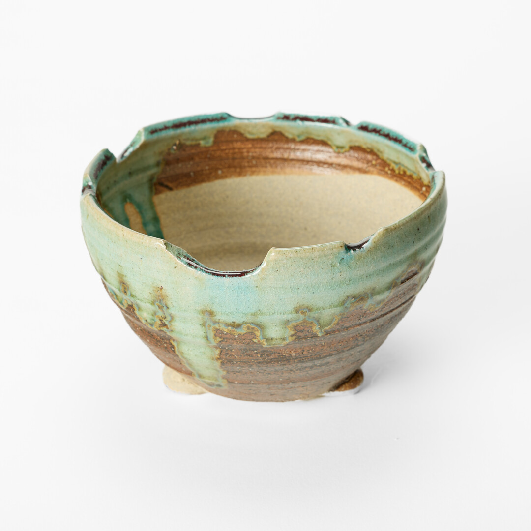 A Shigaraki-yaki plant pot with an uneven edge from Japan House London