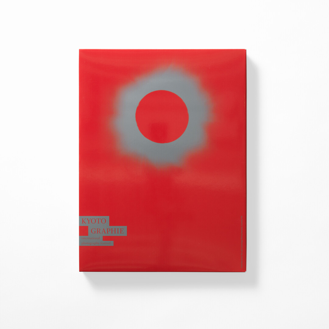 A red cover of Kyotographie 2024 Catalogue from Japan House London.
