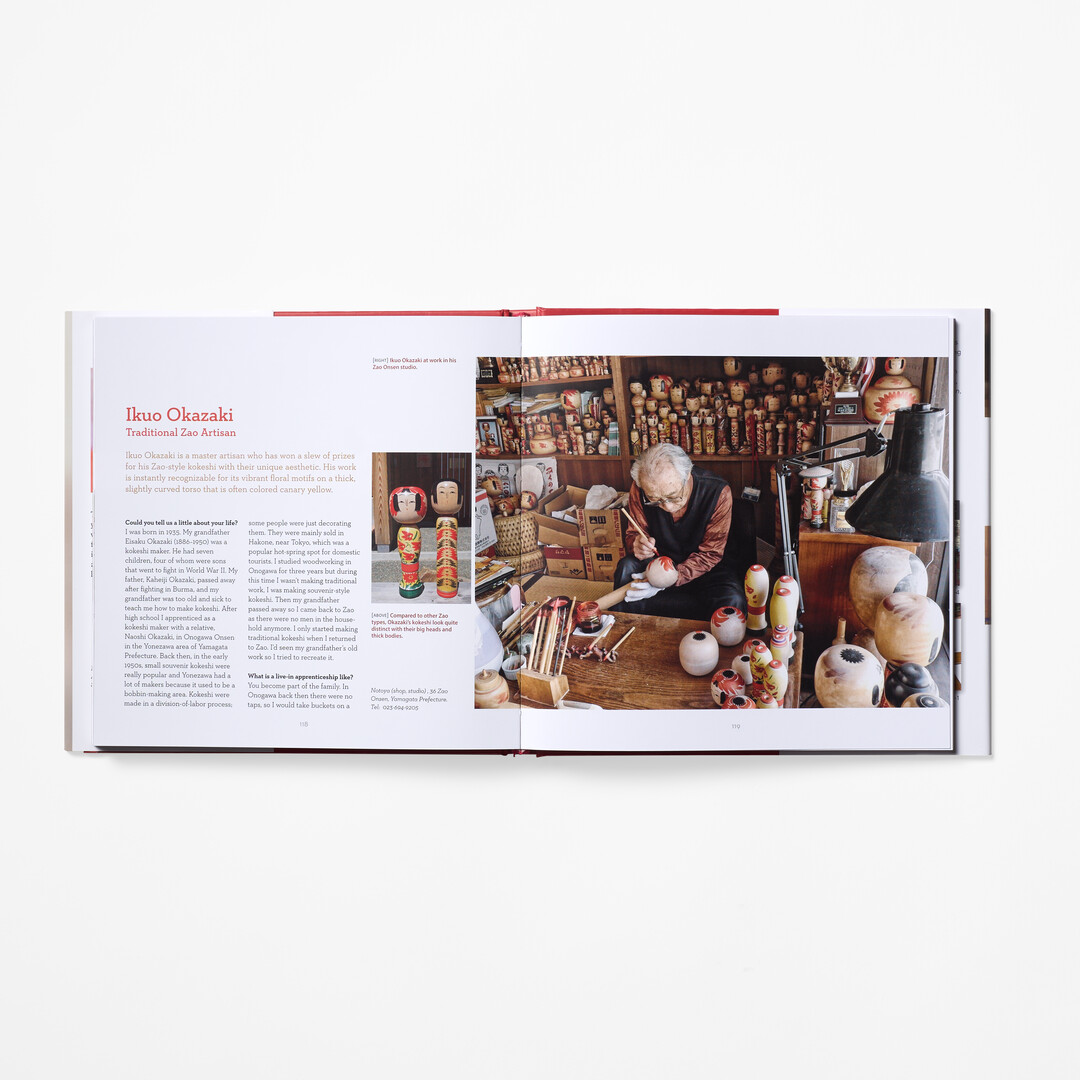 A spread with a photograph of kokeshi being made from book Japanese Kokeshi Dolls from Japan House London.