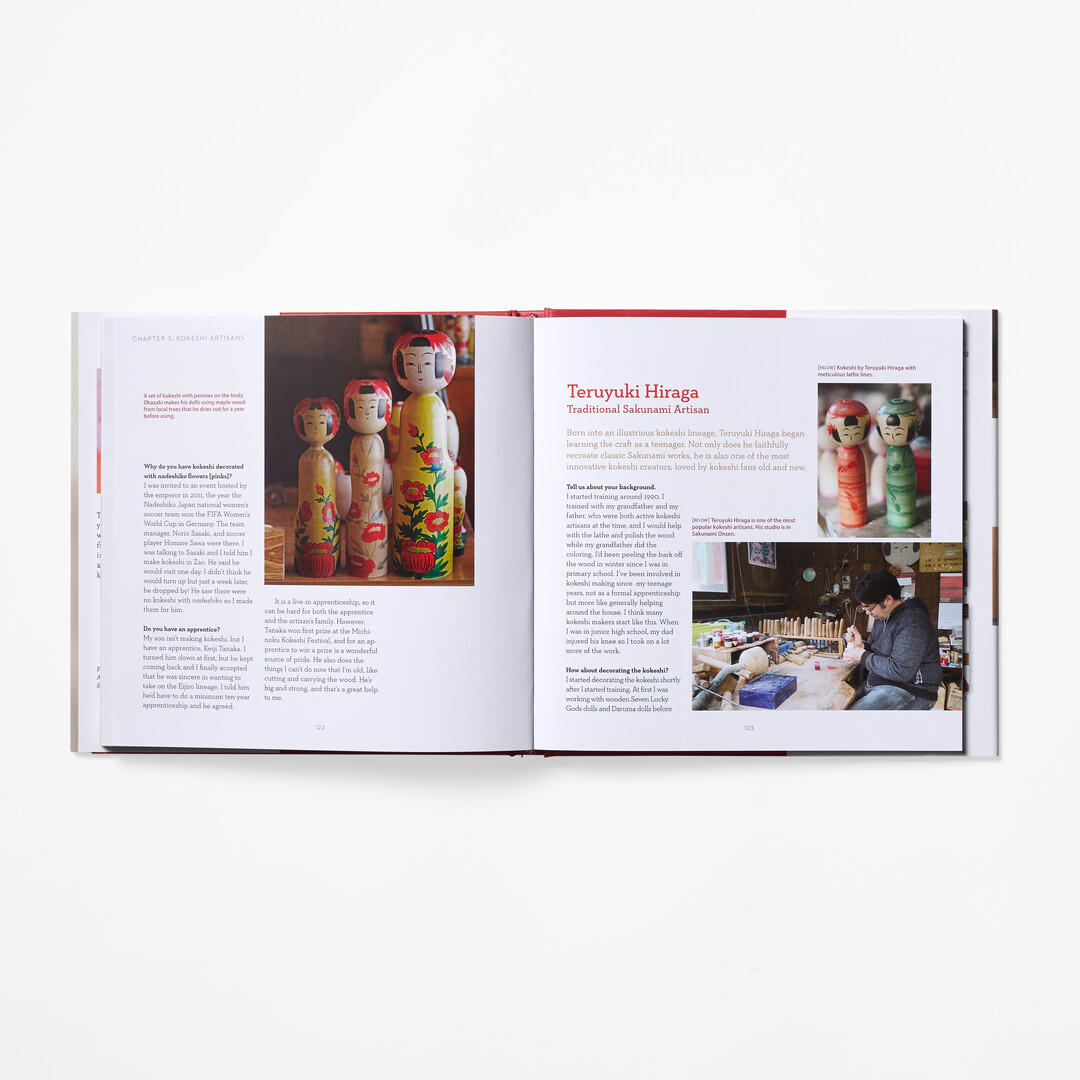 A spread with a photograph of kokeshi from book Japanese Kokeshi Dolls from Japan House London.
