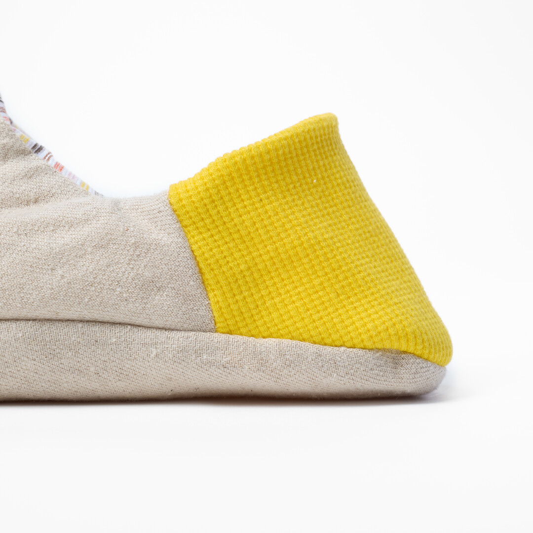 Pick Stripe Knapsack Merippa Slippers with yellow heel and beige body from Japan House London.