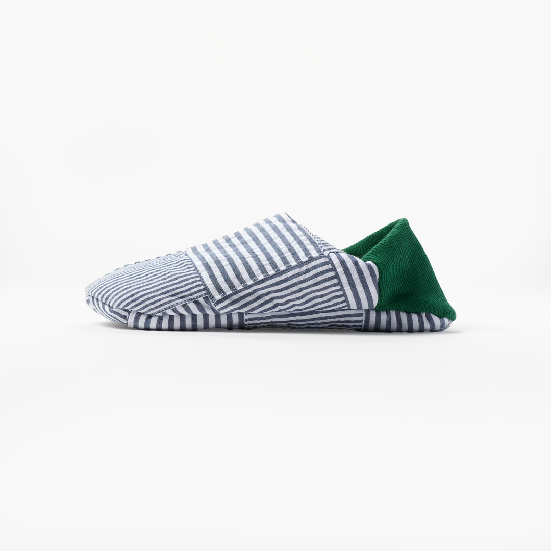 Merippa slipper with blue and white striped body and green heel from Japan House London.