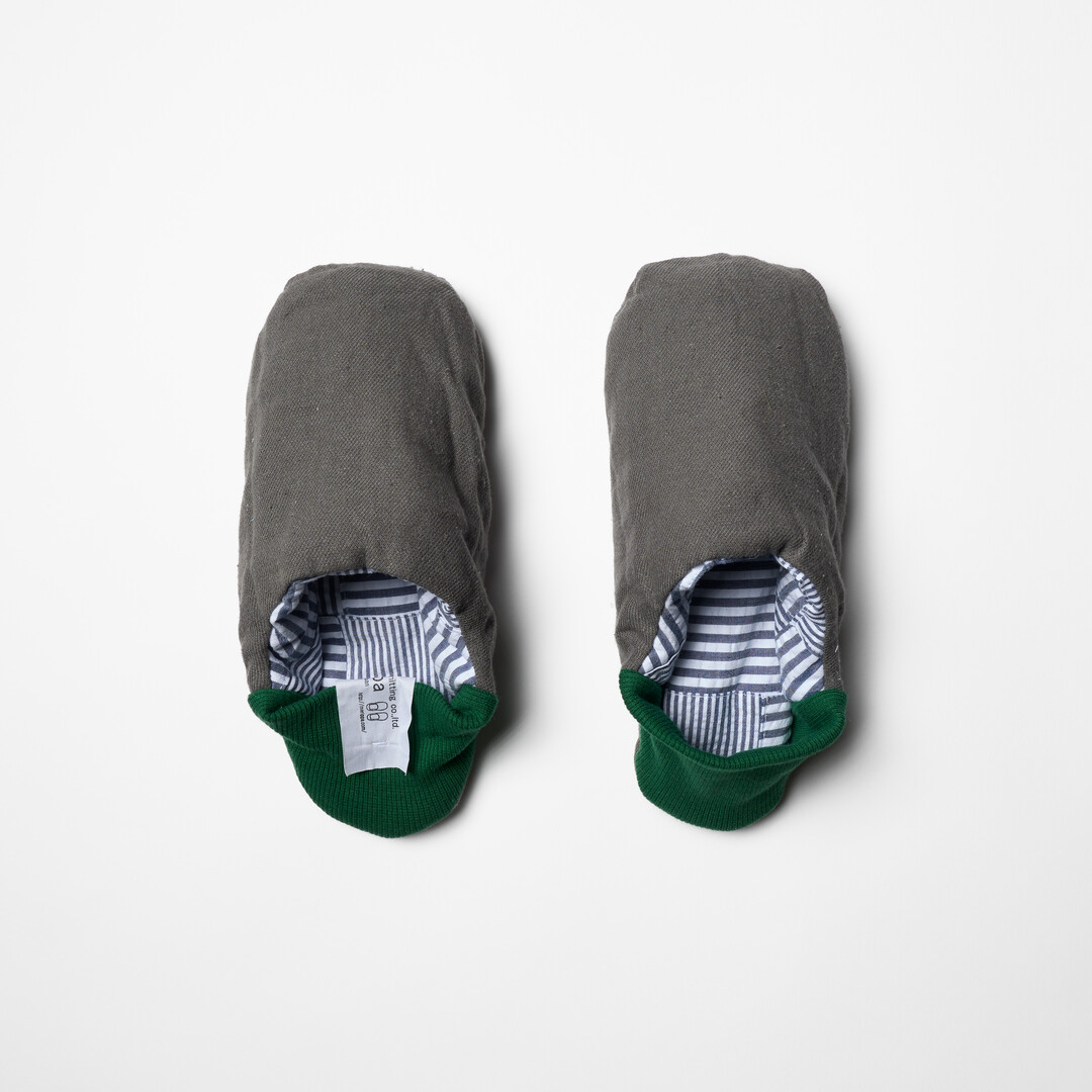 Merippa slipper with grey body and green heel from Japan House London.