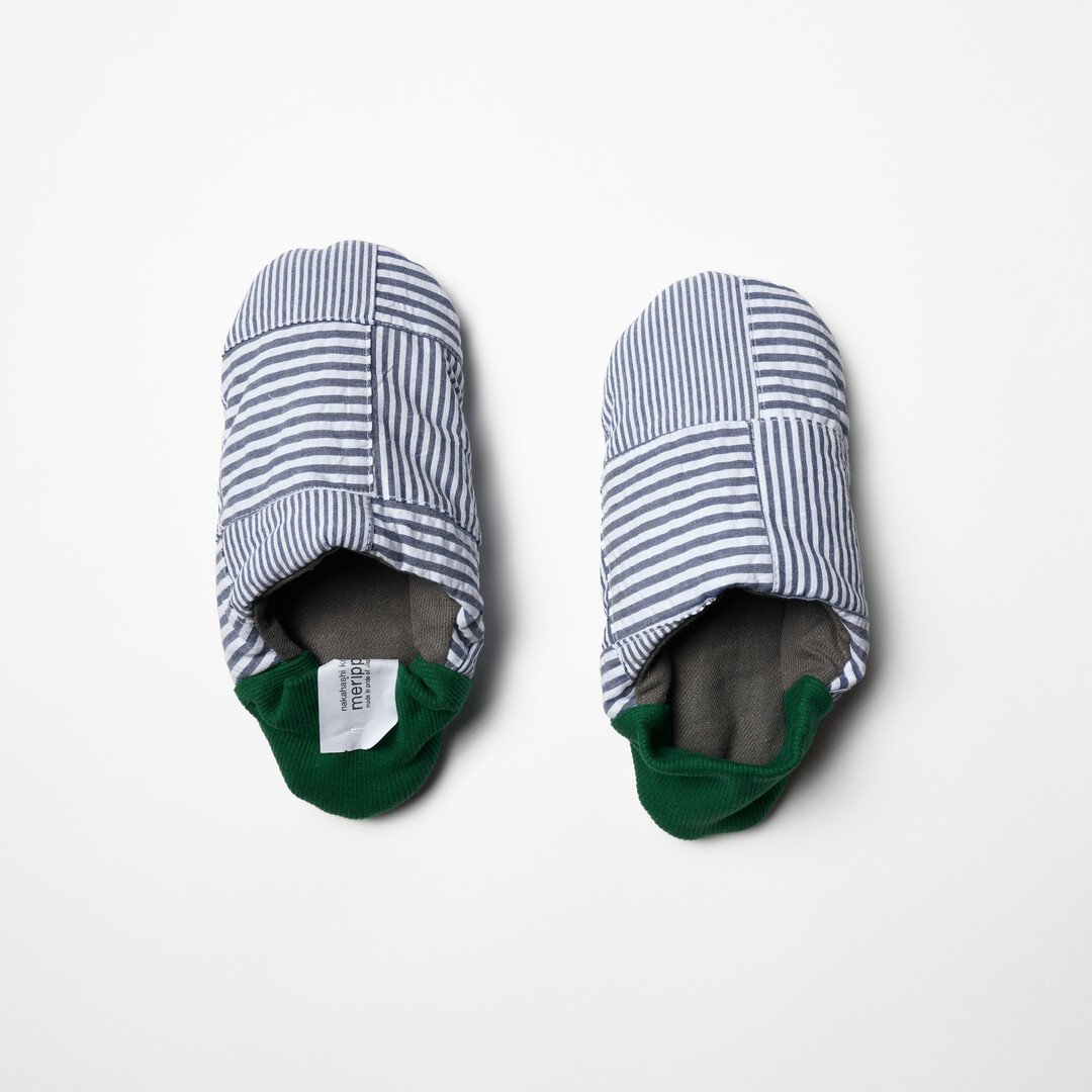 Merippa slipper with blue and white striped body and green heel from Japan House London.