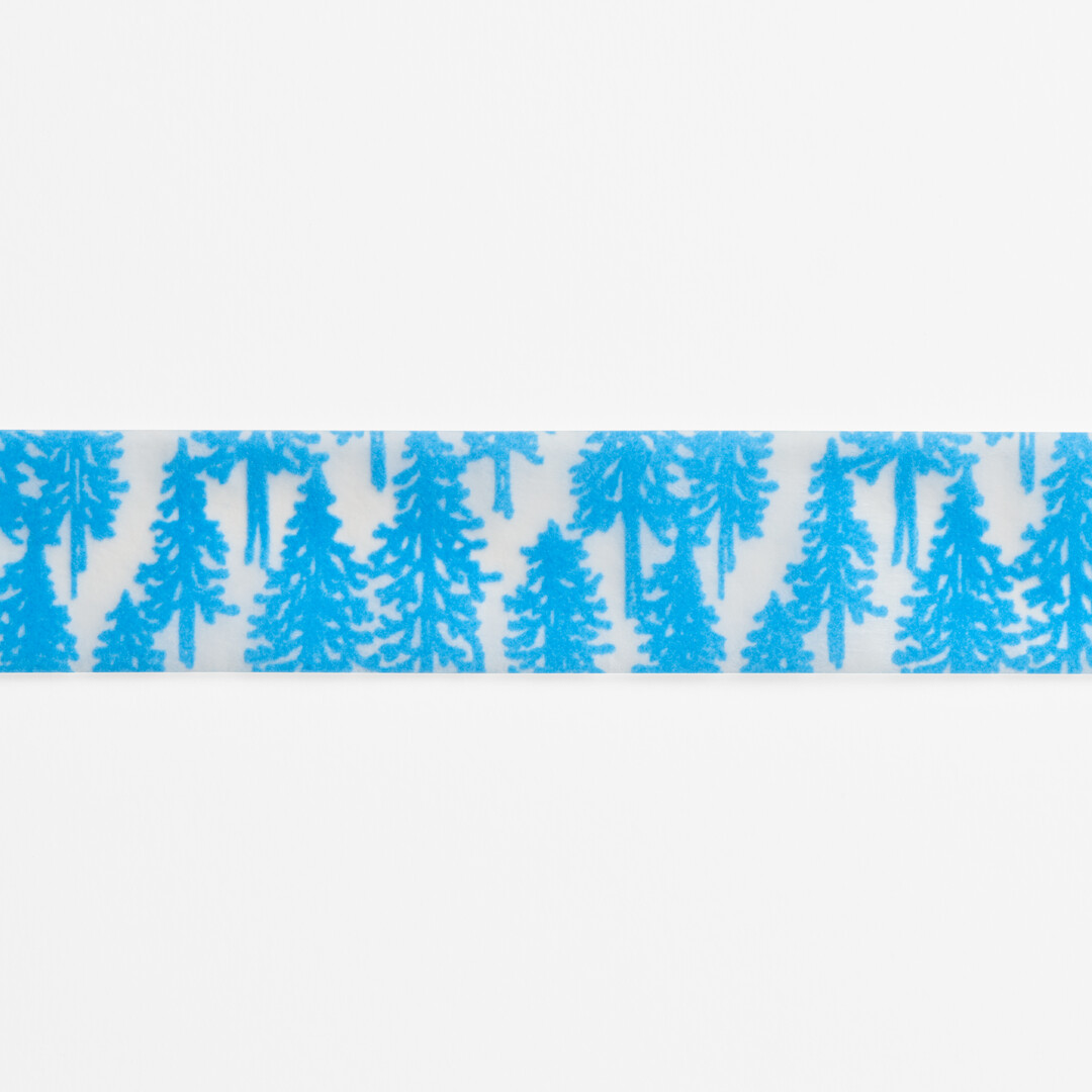 Washi tape designed by minä perhonen with a flocked tree pattern from Japan House London.