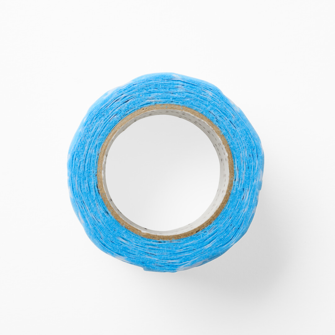 Washi tape designed by minä perhonen with a flocked tree pattern from Japan House London.