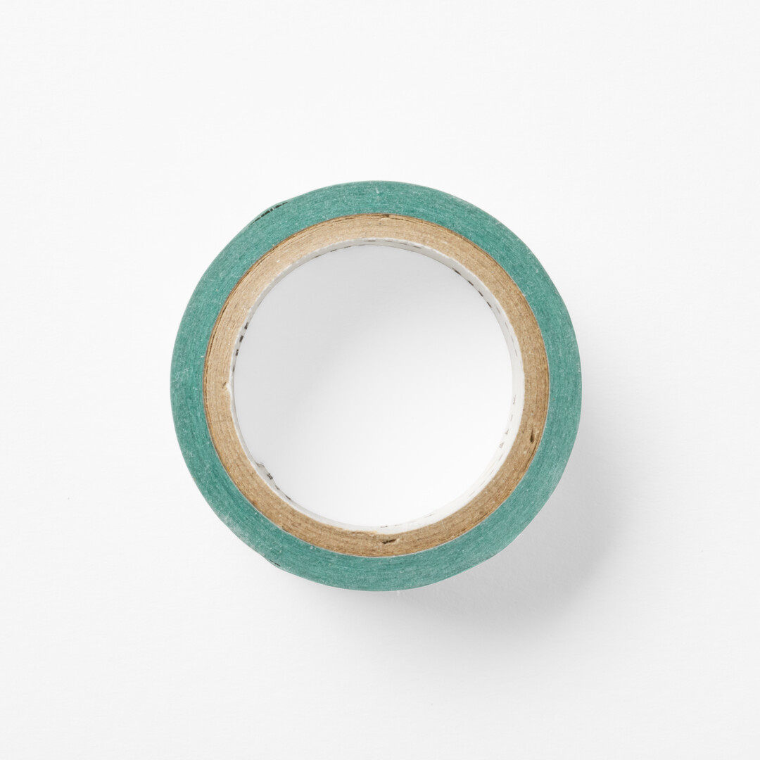 Washi tape with a light green background with a metalic pattern that creates an eye-catching sheen from Japan House London.