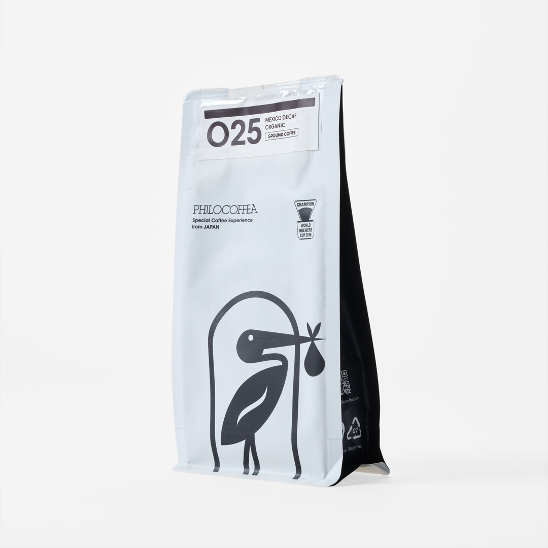 025 Decaf Mexico 200g - Ground Coffee in a black and white package with a bird from Japan House London.