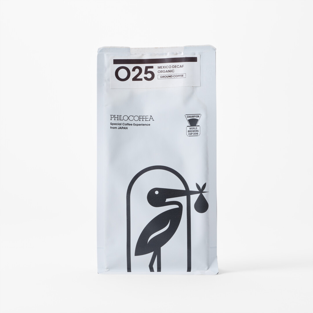 025 Decaf Mexico 200g - Ground Coffee in a black and white package with a bird from Japan House London.